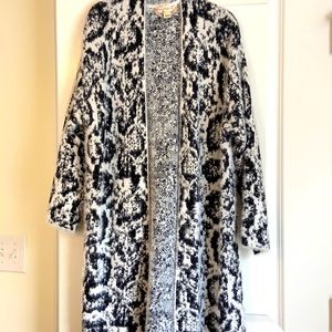Black & white full length sweater.